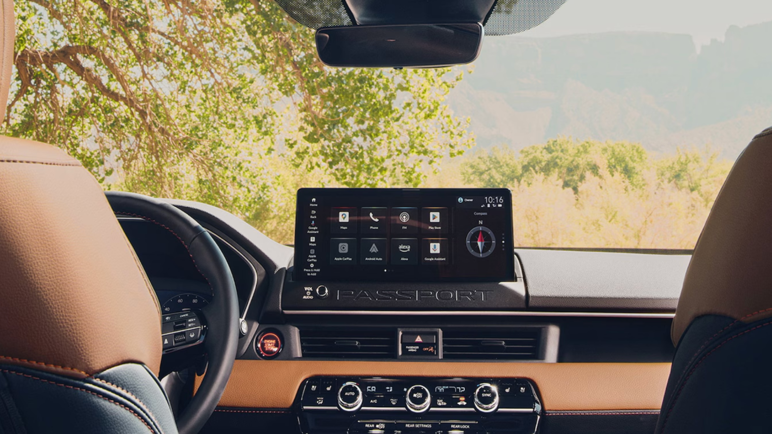 Honda Passport interior dashboard with touchscreen infotainment and climate controls.